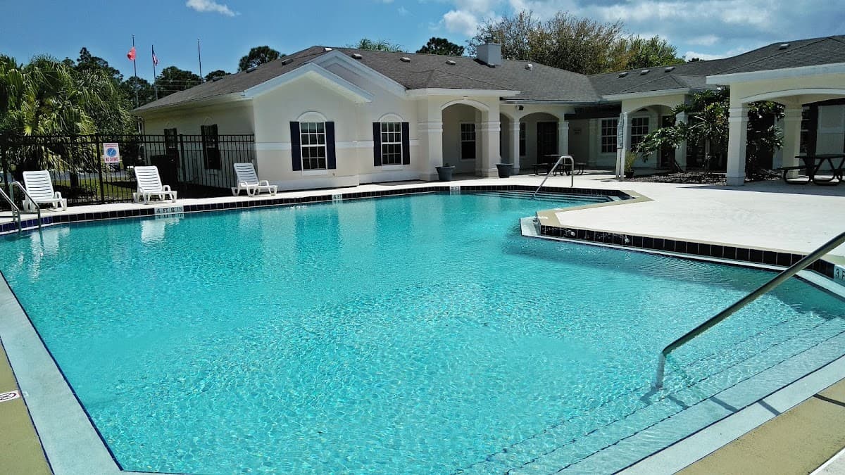 Park at Palm Bay Apartments - Parking in Palm Bay, FL